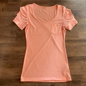 Small lightweight pink Guess top.